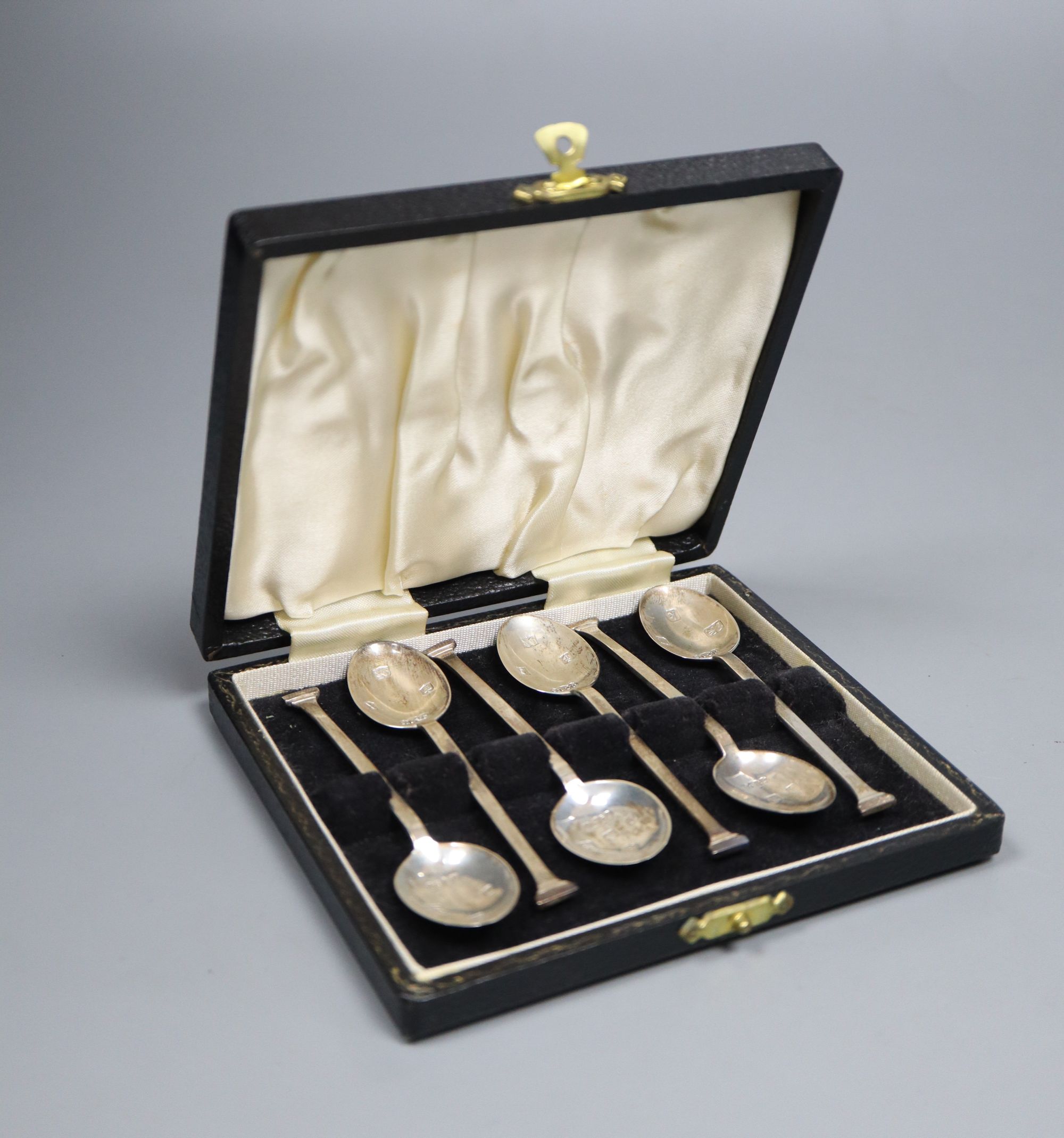 A 1960s cased set of six silver teaspoons, struck with marks of six various Assay offices, 46 grams.